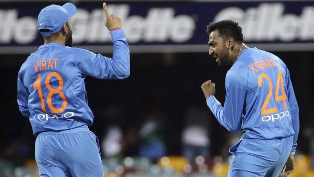 Krunal Pandya, center, celebrates with Virat Kohli, left, after dismissing Australia's Glen Maxwell.(AP)