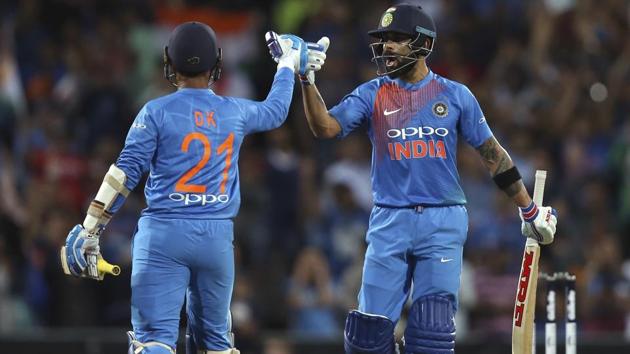 India's Virhat Kohli right, celebrates with teammate Dinesh Karthik during their Twenty20 cricket match against Australia. (AP) India's Virhat Kohli right, celebrates with teammate Dinesh Karthik during their Twenty20 cricket match against Australia. (AP)