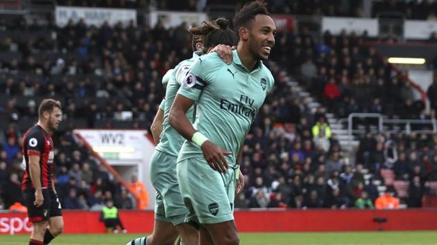 Arsenal's Pierre-Emerick Aubameyang celebrates scoring his side's second goal of the game against Bournemouth.(AP)