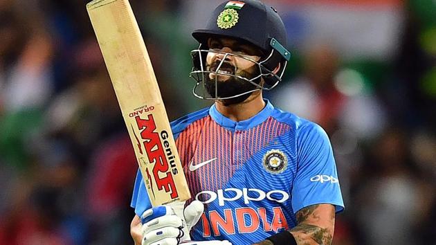 Virat Kohli celebrates as he completes his 50-runs during a T20 international cricket match against Australia. (AFP) Virat Kohli celebrates as he completes his 50-runs during a T20 international cricket match against Australia. (AFP)