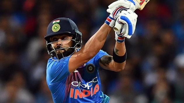 Virat Kohli plays a shot during a T20 international cricket match against Australia at the SCG in Sydney.(AFP)