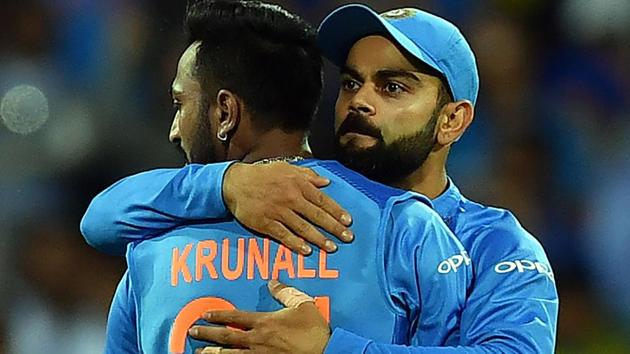 Virat Kohli (R) greets spin bowler Kurnal Pandya for his wicket off Australia's batsman Glenn Maxwell.(AFP) Virat Kohli (R) greets spin bowler Kurnal Pandya for his wicket off Australia's batsman Glenn Maxwell.(AFP)