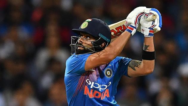 India's batsman Virat Kohli plays a shot during a T20 international cricket match against Australia at the SCG(AFP)