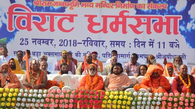Seers from different ashrams gather at the programme venue as they participate in Dharam Sabha, being organised by the Vishwa Hindu Parishad, in Ayodhya on Sunday, Nov. 25, 2018.(Deepak Gupta / Hindustan Times) Seers from different ashrams gather at the programme venue as they participate in Dharam Sabha, being organised by the Vishwa Hindu Parishad, in Ayodhya on Sunday, Nov. 25, 2018.(Deepak Gupta / Hindustan Times)