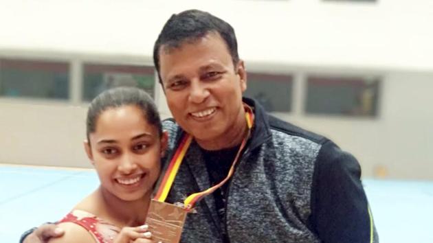 Cottbus : Indian gymnast Dipa Karmakar poses with her coach Bisweswar Nandi after wining bronze in Vault event at Artistic Gymnastic World Cup in Cottbus, Germany, Saturday, Nov 20, 2018(PTI)