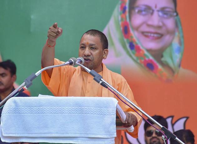 Uttar Pradesh chief minister Yogi Adityanath addresses as he campaigns for the upcoming Madhya Pradesh assembly elections in Itarsi.(PTI Photto)