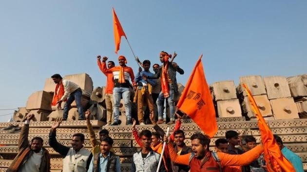 Supporters of the Vishva Hindu Parishad (VHP) shout slogans after attending Dharma Sabha, organised by the VHP in Ayodhya on November 25.(REUTERS) Supporters of the Vishva Hindu Parishad (VHP) shout slogans after attending Dharma Sabha, organised by the VHP in Ayodhya on November 25.(REUTERS)