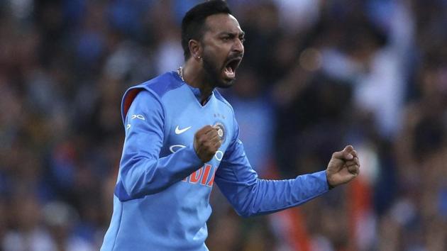 Krunal Pandya celebrates after taking the wicket of Australia's Ben McDermott.(AP)