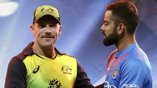 Australia's Aaron Finch, left, and India's Virat Kohli shake hands after their Twenty20 cricket match in Sydney. (AP) Australia's Aaron Finch, left, and India's Virat Kohli shake hands after their Twenty20 cricket match in Sydney. (AP)