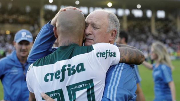Palmeiras coach Luiz Felipe Scolari celebrates with Felipe Melo after winning the Brasileiro Championship title. (REUTERS) Palmeiras coach Luiz Felipe Scolari celebrates with Felipe Melo after winning the Brasileiro Championship title. (REUTERS)