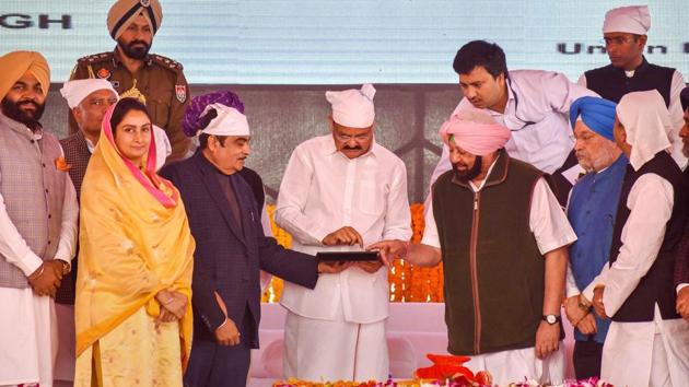 Vice President Venkaiah Naidu, Union Transport Minister Nitin Gadkari, Punjab Chief Minister Capt Amarinder Singh with others during foundation stone laying ceremony for Gurdwara Kartarpur Sahib Corridor at Dera Baba Nanak, in Gurdaspur. “The corridor will become a symbol of love and peace between both countries. Now, you would be able to visit the holy Kartarpur site directly,” said Naidu. (PTI) Vice President Venkaiah Naidu, Union Transport Minister Nitin Gadkari, Punjab Chief Minister Capt Amarinder Singh with others during foundation stone laying ceremony for Gurdwara Kartarpur Sahib Corridor at Dera Baba Nanak, in Gurdaspur. “The corridor will become a symbol of love and peace between both countries. Now, you would be able to visit the holy Kartarpur site directly,” said Naidu. (PTI)