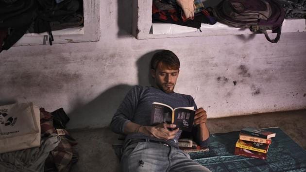 Rahul Vajpayi has closeted himself in his tiny room in the theatre hostel building in Shahjahanpur in Uttar Pradesh (UP), his home for eight years. The 26-year-old actor is rehearsing the role of Cassio in the upcoming play Othello. He has got his short beard coloured light brown for the part. “I will crack this role in no time. Just watch,” he says. (Burhaan Kinu/HT PHOTO) Rahul Vajpayi has closeted himself in his tiny room in the theatre hostel building in Shahjahanpur in Uttar Pradesh (UP), his home for eight years. The 26-year-old actor is rehearsing the role of Cassio in the upcoming play Othello. He has got his short beard coloured light brown for the part. “I will crack this role in no time. Just watch,” he says. (Burhaan Kinu/HT PHOTO)