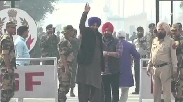 Navjot Singh Sidhu crosses Attari-Wagah border to Pakistan on Tuesday. Sidhu was invited by Pakistan Foreign Minister Shah Mahmood Qureshi to attend the ground breaking ceremony of Kartarpur Corridor on 28th November and has drawn much flak from within the Congress party over his decision. Punjab CM Captain Amarinder Singh has already turned down Pakistan’s invitation citing state-sponsored terrorism by Islamabad. (ANI) Navjot Singh Sidhu crosses Attari-Wagah border to Pakistan on Tuesday. Sidhu was invited by Pakistan Foreign Minister Shah Mahmood Qureshi to attend the ground breaking ceremony of Kartarpur Corridor on 28th November and has drawn much flak from within the Congress party over his decision. Punjab CM Captain Amarinder Singh has already turned down Pakistan’s invitation citing state-sponsored terrorism by Islamabad. (ANI)