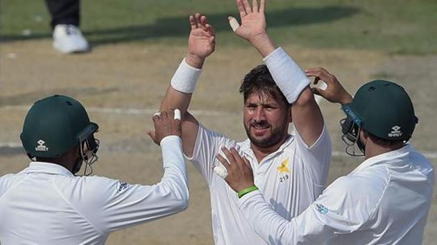 Pakistani spinner Yasir Shah (C) celebrates with teammates after taking the wicket of New Zealand batsman Neil Wagner during the third day of the second Test cricket match between Pakistan and New Zealand at the Dubai International Stadium in Dubai on November 26, 2018 (AFP) Pakistani spinner Yasir Shah (C) celebrates with teammates after taking the wicket of New Zealand batsman Neil Wagner during the third day of the second Test cricket match between Pakistan and New Zealand at the Dubai International Stadium in Dubai on November 26, 2018 (AFP)