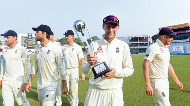 England cricket team captain Joe Root (C) poses with the winner's trophy after defeating Sri Lanka by 42 runs on the fourth day of the third Test match at the Sinhalese Sports Club (SSC) (AFP) England cricket team captain Joe Root (C) poses with the winner's trophy after defeating Sri Lanka by 42 runs on the fourth day of the third Test match at the Sinhalese Sports Club (SSC) (AFP)