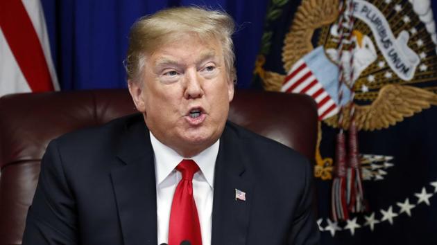 Trump he doesn’t believe his own government’s report last week warning of massive economic losses if carbon emissions continue to feed climate change unchecked. (AP) Trump he doesn’t believe his own government’s report last week warning of massive economic losses if carbon emissions continue to feed climate change unchecked. (AP)