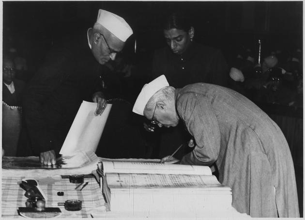 Jawaharlal Nehru signs on the new Constitution. On the 69th Constitution Day (November 26), Chief Justice of India Ranjan Gogoi said it was in “our best interest” to heed the advice of the Constitution as not doing so would result in a “sharp descent into chaos”(PIB)