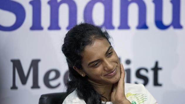 Indian badminton player P.V. Sindhu attends a press conference in Hyderabad, India, Thursday, Aug. 30, 2018. Sindhu won the silver medal for the women's single badminton at the 18th Asian Games in Jakarta, Indonesia(AP)