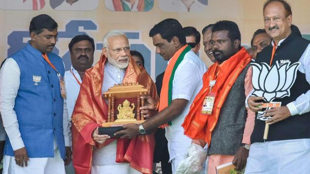 Addressing his first rally in Telangana at Nizamabad, Prime Minister Narendra Modi took on caretaker chief minister K Chandrashekar Rao, saying that he had not kept the promises he had made to the people of the state. Modi said that when KCR was elected CM, he had promised to turn Nizamabad into London. (PTI) Addressing his first rally in Telangana at Nizamabad, Prime Minister Narendra Modi took on caretaker chief minister K Chandrashekar Rao, saying that he had not kept the promises he had made to the people of the state. Modi said that when KCR was elected CM, he had promised to turn Nizamabad into London. (PTI)