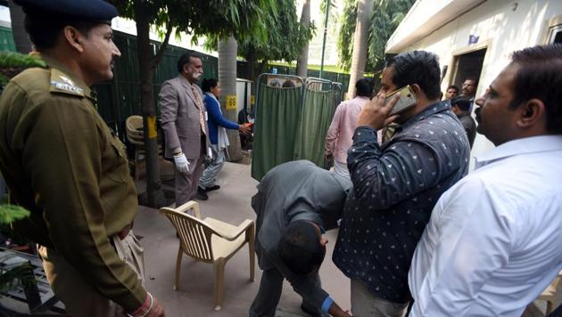 Delhi police personnel search a man during his visit to the Janta Darbar at Delhi chief Minister Arvind Kejriwal's residence in New Delhi, India on Tuesday, November 27, 2018.(Sonu Mehta/HT PHOTO)