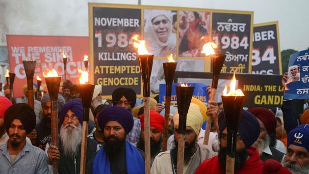 The Delhi High Court on Wednesday upheld the conviction of 88 convicts in the 1984 anti-Sikh riots in Delhi. The 88 convicts had been arrested in East Delhi’s Trilokpuri area and had been sentenced to 5-year jail terms each by a trial court in 1996. The convicts had been held guilty of rioting, burning houses and curfew violations by the trial court. (Natinder Nanu / AFP File) The Delhi High Court on Wednesday upheld the conviction of 88 convicts in the 1984 anti-Sikh riots in Delhi. The 88 convicts had been arrested in East Delhi’s Trilokpuri area and had been sentenced to 5-year jail terms each by a trial court in 1996. The convicts had been held guilty of rioting, burning houses and curfew violations by the trial court. (Natinder Nanu / AFP File)