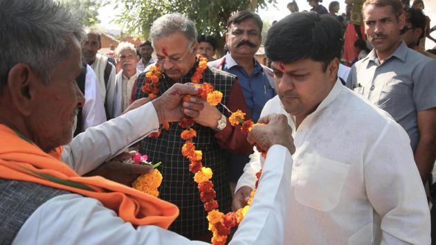 BJP MP Dushyant Singh (in white kurta) is campaigning on behalf of his mother, chief minister Vasundhara Raje, who is busy criss-crossing the state holding rallies ahead of the assembly elections in Rajasthan.(Himanshu Vyas / HT Photo)