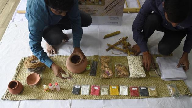 Workers arrange the various materials of “a final rites kit” at the company SarvaPooja’s manufacturing unit in Mumbai. Grieving families normally have to rush between shops buying dozens of items needed to say goodbye to loved ones but now online companies are offering a one-stop solution with “final rites kits”. (Indranil Mukherjee / AFP)