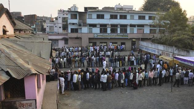 Voters stand in queues to cast their ballots for the Madhya Pradesh state assembly elections in Jabalpur on November 28.(AP Photo) Voters stand in queues to cast their ballots for the Madhya Pradesh state assembly elections in Jabalpur on November 28.(AP Photo)
