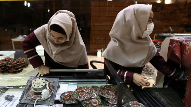 Novin Saffron workers pack filaments. At his factory, Shariati said the problem is easily solvable with better education and support for villagers, which could boost Iran’s production from 400 to 1,000 tonnes per year. The biggest issue for farmers, he recognised, was navigating Iran’s banking sector –notoriously reluctant to lend to small businesses. (Atta Kenare / AFP) Novin Saffron workers pack filaments. At his factory, Shariati said the problem is easily solvable with better education and support for villagers, which could boost Iran’s production from 400 to 1,000 tonnes per year. The biggest issue for farmers, he recognised, was navigating Iran’s banking sector –notoriously reluctant to lend to small businesses. (Atta Kenare / AFP)