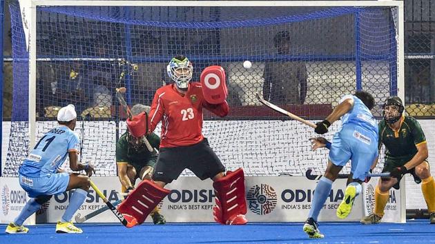 India's Mandeep Singh (in blue) attempts a goal during their match against South Africa for Men's Hockey World Cup 2018, in Bhubaneswar(PTI)