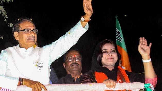Madhya Pradesh chief minister Shivraj Singh Chouhan at a roadshow in support of BJP candidate from Bhopal North assembly constitutency Fatima Rasool Siddiqui (R) for State Assembly election, in Bhopal on November 22, 2018.(PTI) Madhya Pradesh chief minister Shivraj Singh Chouhan at a roadshow in support of BJP candidate from Bhopal North assembly constitutency Fatima Rasool Siddiqui (R) for State Assembly election, in Bhopal on November 22, 2018.(PTI)