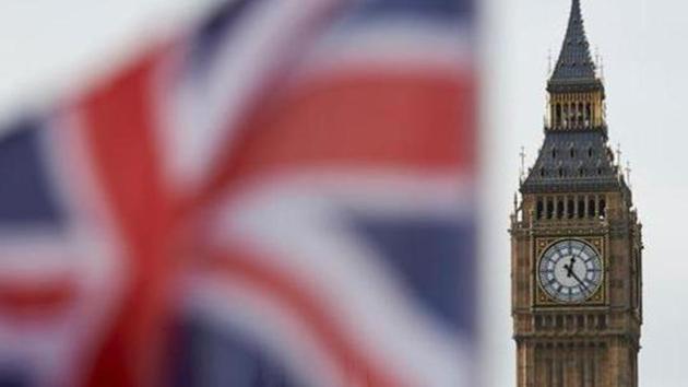 A Union flag flies in the wind in front of the Big Ben clock face and the Elizabeth Tower at the Houses of Parliament in central London on November 3.(AFP Photo) A Union flag flies in the wind in front of the Big Ben clock face and the Elizabeth Tower at the Houses of Parliament in central London on November 3.(AFP Photo)