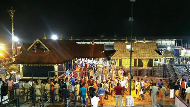 Sabarimala: Devotees pay obeisance Lord Ayyappa temple in Sabarimala. Kerala has been witnessing massive protests by Ayyappa devotees opposing the entry of girls and women of menstrual age into the Sabarimala temple since the government decided to implement the apex court order. (File Photo)(PTI)