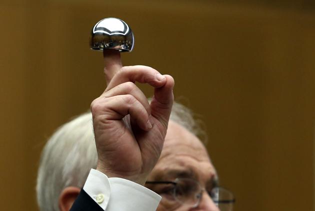 Michael Kelly, attorney for plaintiff Loren Kransky, holds up an ASR XL hip implant in his opening statement to the jury. In the biggest ever payout for disability not leading to death, the government has directed the multinational major Johnson & Johnson (J&J ) to pay up to <span class='webrupee'>₹</span>1.2 crore each along with an additional <span class='webrupee'>₹</span>10 lakh for “non pecuniary” losses as compensation to patients who were sold faulty hip implants between 2006 and 2010(Bloomberg)