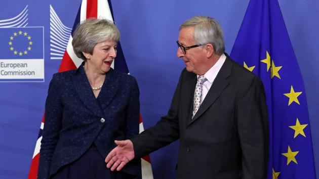 British Prime Minister Theresa May meets with European Commission President Jean-Claude Juncker to discuss draft agreements on Brexit, at the EC headquarters in Brussels, Belgium. (Yves Herman / REUTERS) British Prime Minister Theresa May meets with European Commission President Jean-Claude Juncker to discuss draft agreements on Brexit, at the EC headquarters in Brussels, Belgium. (Yves Herman / REUTERS)