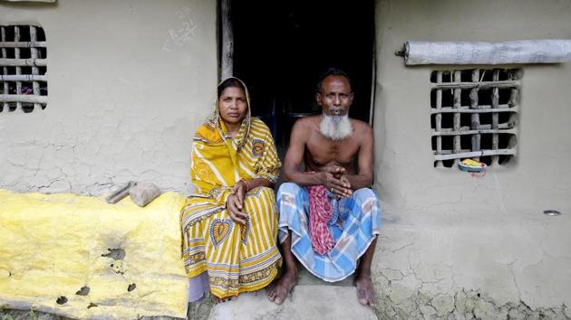 Sheikh Aftab Uddin, 66, and his wife Mamta Bibi, 50, outside their new mud house after their previous house was washed away due to high tides. “If government gives rehabilitation I will leave,”Aftab Uddin said. The tiny island is home to 4,800 people, down from 7,000 a decade ago. (Rupak De Chowdhuri / REUTERS) Sheikh Aftab Uddin, 66, and his wife Mamta Bibi, 50, outside their new mud house after their previous house was washed away due to high tides. “If government gives rehabilitation I will leave,”Aftab Uddin said. The tiny island is home to 4,800 people, down from 7,000 a decade ago. (Rupak De Chowdhuri / REUTERS)