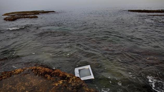 A TV screen floats next to rocky coastal area in the Mediterranean Sea on the Beirut. “You can open a cafe under water and invite your friends,” Obeitri, the fisherman added sarcastically. (Hassan Ammar / AP) A TV screen floats next to rocky coastal area in the Mediterranean Sea on the Beirut. “You can open a cafe under water and invite your friends,” Obeitri, the fisherman added sarcastically. (Hassan Ammar / AP)