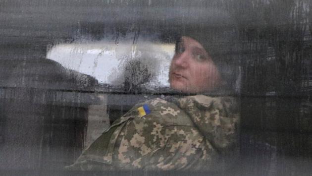 A detained Ukrainian serviceman and crew member of one of Ukrainian naval ships, which were recently seized by Russia’s FSB security service, looks out of a minibus window outside a court building in Simferopol, Crimea. (Pavel Rebrov / REUTERS) A detained Ukrainian serviceman and crew member of one of Ukrainian naval ships, which were recently seized by Russia’s FSB security service, looks out of a minibus window outside a court building in Simferopol, Crimea. (Pavel Rebrov / REUTERS)