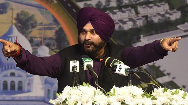 Navjot Singh Sidhu addresses the groundbreaking ceremony for the Kartarpur Corridor in Kartarpur, Pakistan.(AFP Photo) Navjot Singh Sidhu addresses the groundbreaking ceremony for the Kartarpur Corridor in Kartarpur, Pakistan.(AFP Photo)