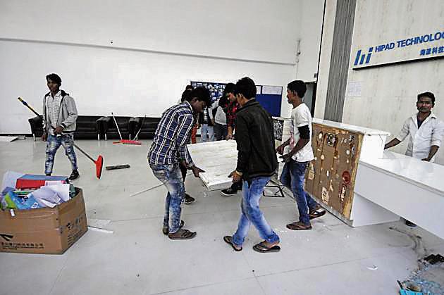 A view inside the Hipad Technology office after the workers of a mobile company pelted stones at the office building and clashed with the security during a protest for not receiving wages for more than three months, at Sector 63, in Noida, India, on Thursday, November 29, 2018. Phase 3 police is looking into the matter (Sunil Ghosh/ Hindustan Times Photo) A view inside the Hipad Technology office after the workers of a mobile company pelted stones at the office building and clashed with the security during a protest for not receiving wages for more than three months, at Sector 63, in Noida, India, on Thursday, November 29, 2018. Phase 3 police is looking into the matter (Sunil Ghosh/ Hindustan Times Photo)