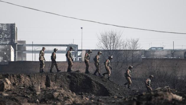 Members of the Chinese military inspect the area after an explosion near a chemical factory in Zhangjiakou, some 200km northwest of Beijing. The explosion and fire left at least 22 people dead and 22 others injured in a northern China city that will host the 2022 Winter Olympics. (Fred Dufour / AFP) Members of the Chinese military inspect the area after an explosion near a chemical factory in Zhangjiakou, some 200km northwest of Beijing. The explosion and fire left at least 22 people dead and 22 others injured in a northern China city that will host the 2022 Winter Olympics. (Fred Dufour / AFP)