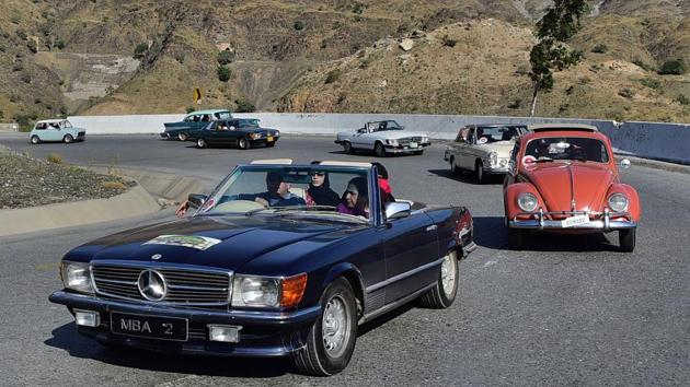 Pakistani people drive vintage cars at the ‘9th Annual Classic Car Rally 2018’ in Landi Kotal, a town in the Khyber Pakhtunkhwa province. (Abdul Majeed / AFP) Pakistani people drive vintage cars at the ‘9th Annual Classic Car Rally 2018’ in Landi Kotal, a town in the Khyber Pakhtunkhwa province. (Abdul Majeed / AFP)