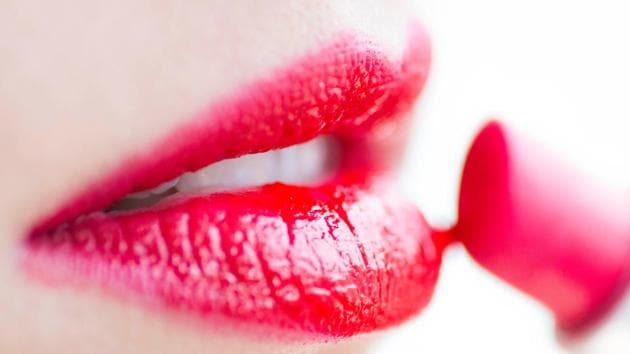 Woman wears a glossy red lipstick which will go with all kinds of attire and add character to one’s look (Unsplash.com) Woman wears a glossy red lipstick which will go with all kinds of attire and add character to one’s look (Unsplash.com)