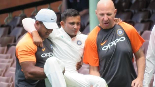 Prithvi Shaw being carried of the pitch by the BCCI medical staff.(BCCI Image)
