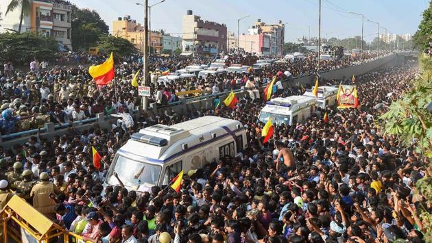 A crowd of fans gather at Kanteerava Studio during the funeral procession of the veteran Kannada actor and politician Ambarish in Bengaluru, Karnataka on November 26, 2018. The actor passed at the age of 66. (Shailendra Bhojak / PTI)