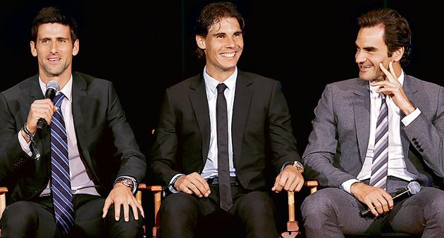 (left) Novak Djokovic of Serbia with Rafael Nadal of Spain and Roger Federer of Switzerland during the ATP Heritage Celebration in New York, 2013.(Getty Images)