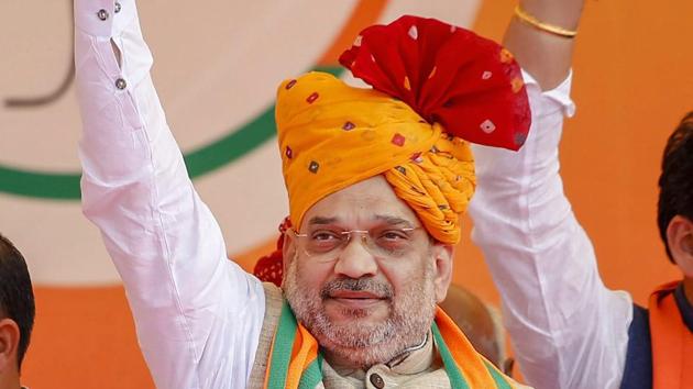 BJP National President Amit Shah during an election campaign in support of its Rajasthan candidates ahead of the upcoming assembly elections, at Kuchaman in Nagaur district. “Stop day dreaming, Rahul baba. Take a look at the election history of the country ever since Modi became the PM, you will realize what is going to be the result of the Rajasthan polls,” Shah said. (PTI)