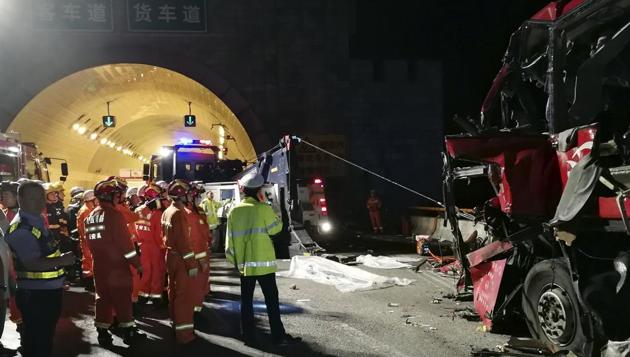 In this photo released by China's Xinhua News Agency, first responders work at the site of an accident after a coach hit the wall of the Qinling Mountains No. 1 Tunnel on the Jingkun Expressway in Ningshan County, northwestern China's Shaanxi Province in August 2017.(AP/Representative Image)