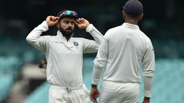 India's captain Virat Kohli (L) talks to Cheteshwar Pujara (R) whilst fielding on the third day of the tour match against Cricket Australia XI at the SCG in Sydney on November 30, 2018 (AFP) India's captain Virat Kohli (L) talks to Cheteshwar Pujara (R) whilst fielding on the third day of the tour match against Cricket Australia XI at the SCG in Sydney on November 30, 2018 (AFP)