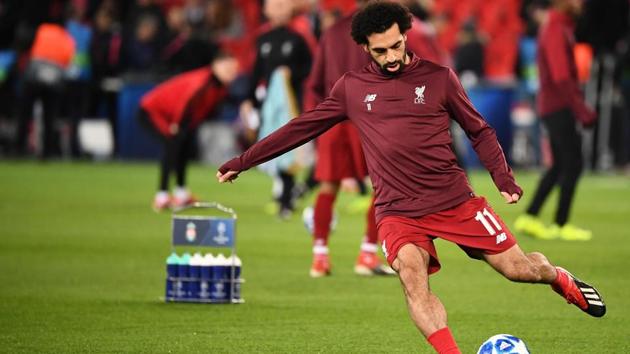 Liverpool's Egyptian forward Mohamed Salah controls the ball prior to the UEFA Champions League Group C football match between Paris Saint-Germain (PSG) and Liverpool FC at the Parc des Princes stadium(AFP)